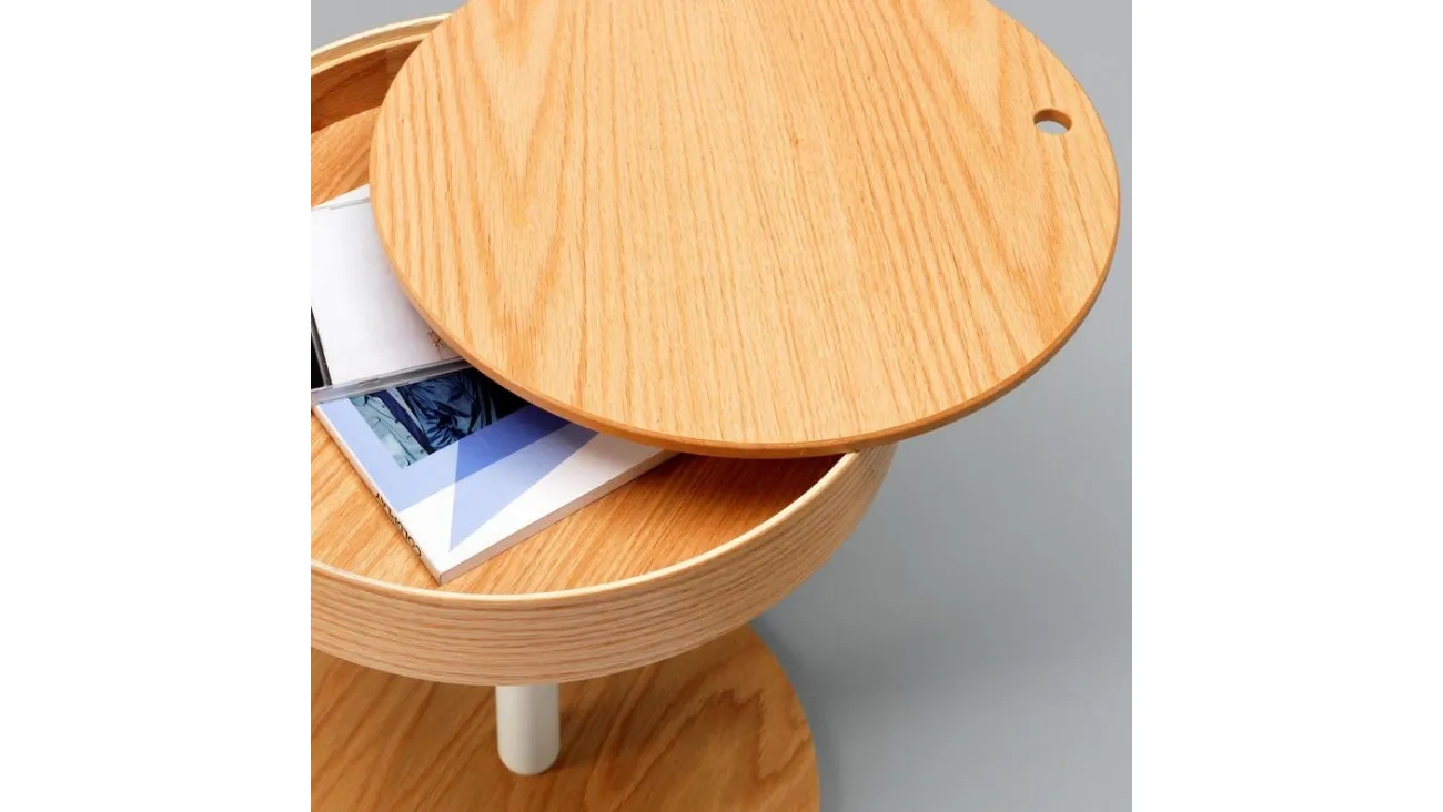 Tavolino Secret con top estraibile in legno curvato e struttura in metallo verniciato di Stones