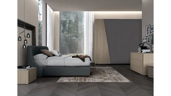 Letto in tessuto imbottito con testiera Golf Snug di Colombini Casa