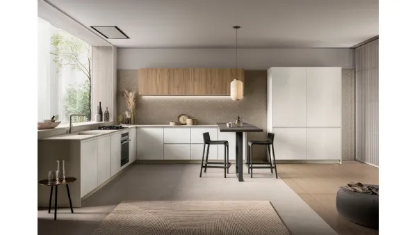 Cucina Moderna angolare con penisola Pura in nobilitato finitura Cemento Artico e Noce Gold di Colombini Casa Artec